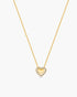 Gold necklace with a heart-shaped pendant on a white background
